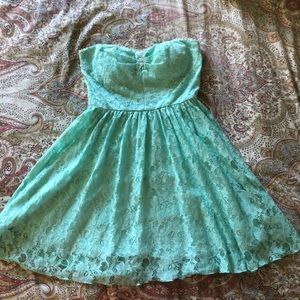 A mini Tiffany Blue lace dress
